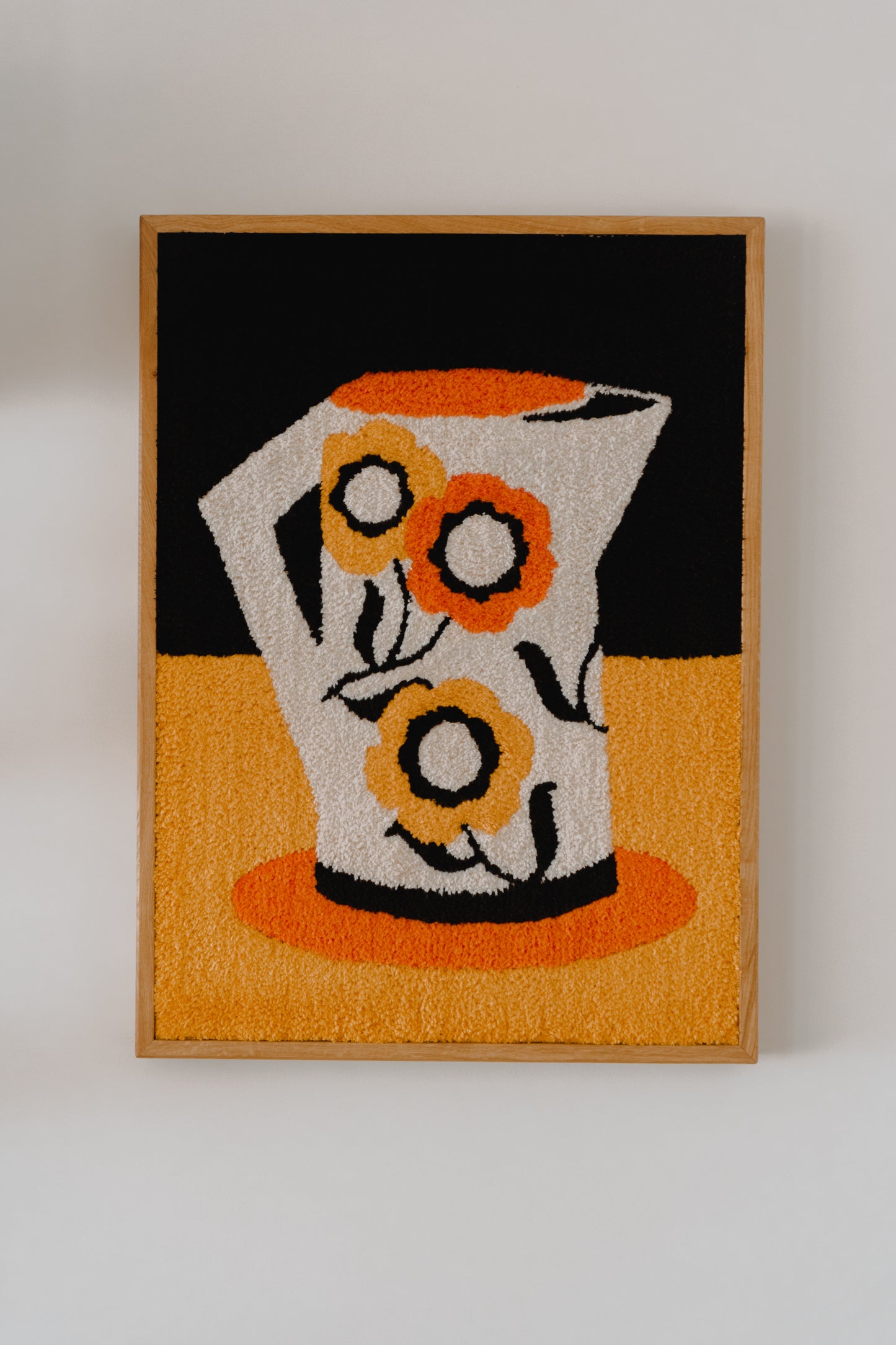 La cruche aux fleurs - Tapis mural encadré